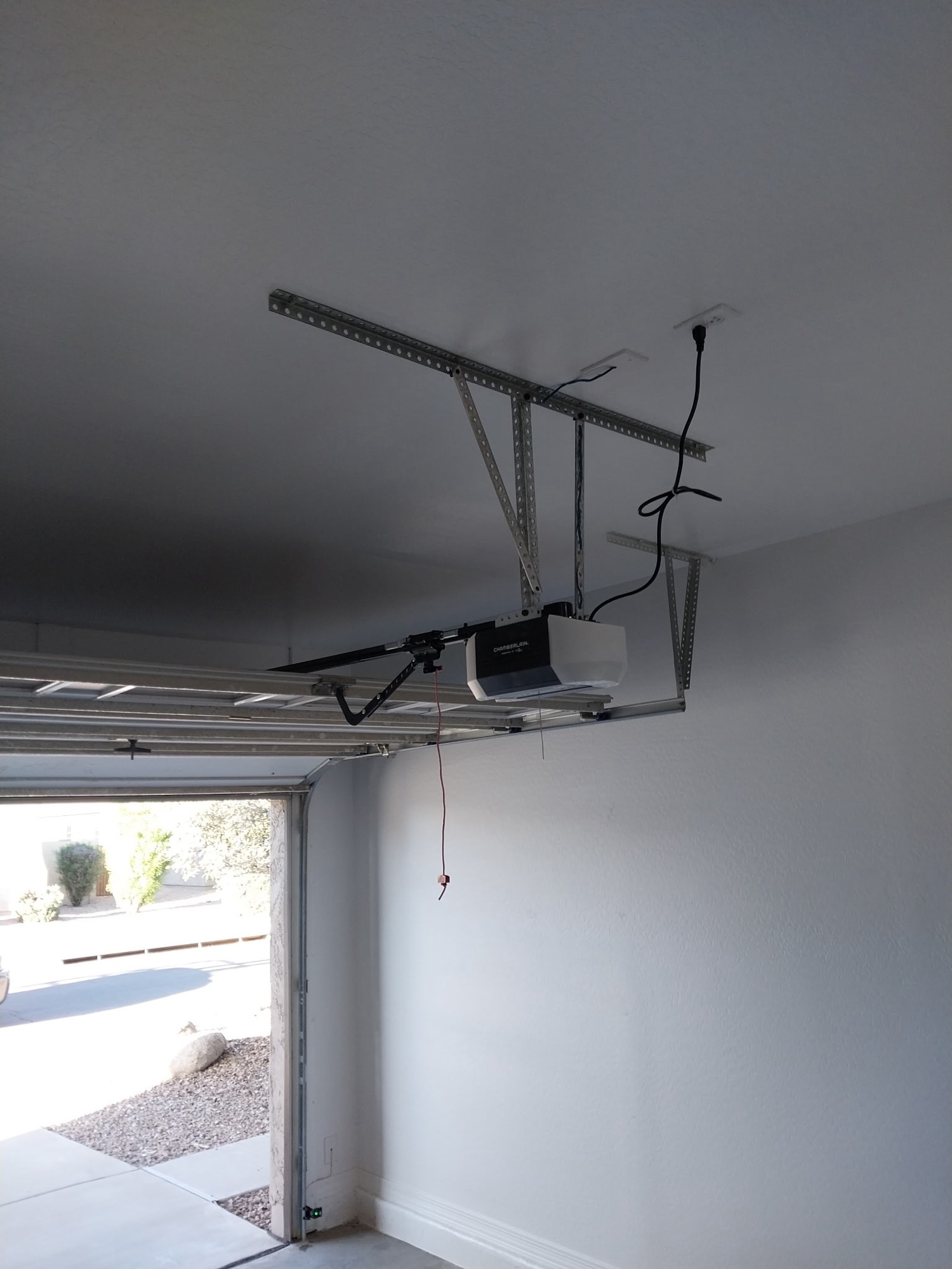 Chamberlain opener motor freshly installed on garage ceiling